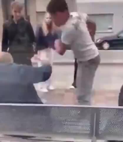 Elderly Belgian man attacked by an import, everyone just stands watching, filming