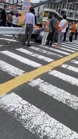 Another angle of the immediate aftermath of former Japanese Prime Minister Shinzo Abe being shot.