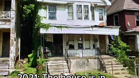 2009:A Boy is standing on his porch in Detroit, Michigan三