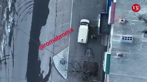 Drone targets Russian policemen trying to get into a car in Donetsk