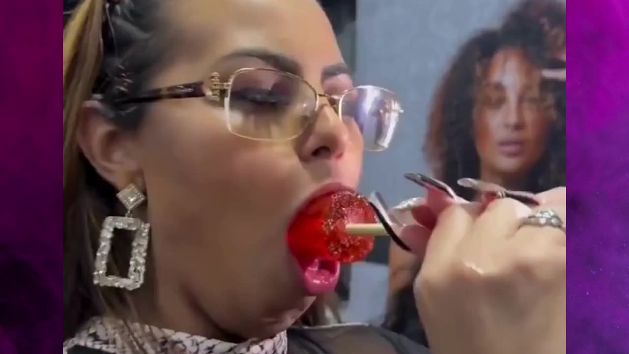 Chick Was Trying Her Hardest To Make This Penis Shaped Lollipop Disappear!