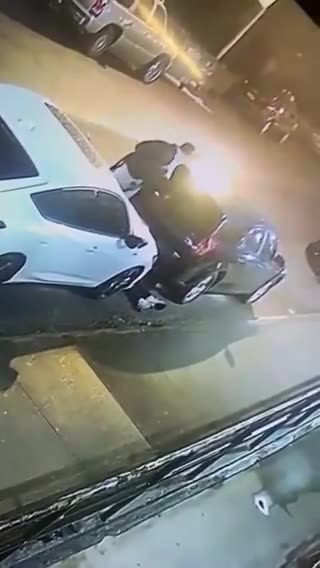 Male flung belt around neck of female, dragged her btween vehicles, and sexually assaults her