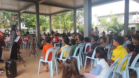 Children sing praising song