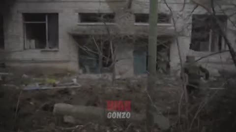 Russian Troops Run Through Bakhmut Ruins