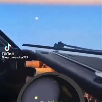 Sun and Moon in the Clouds