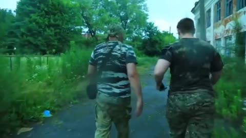 Russian Soldiers Film a Building Used as a Barracks Destroyed By HIMARs