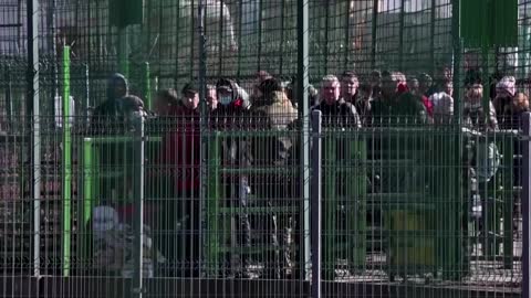 'It's hard to process': Ukrainians flee to Poland