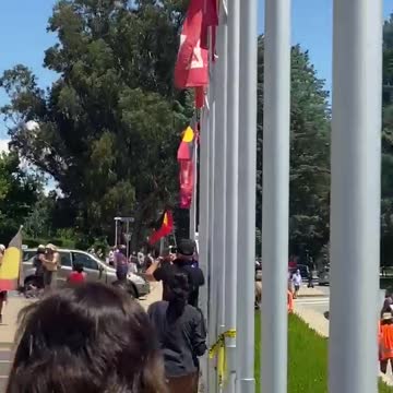 Canberra, Australia - Aboriginals set fire to the old Parliament House