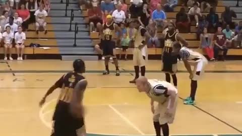 Inside the basketball court a player was performing a magnificent dribble