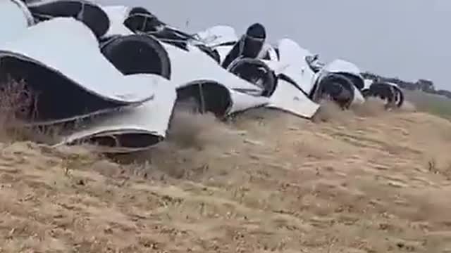 Cruising By A Windmill Graveyard