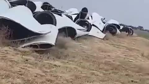 Cruising By A Windmill Graveyard