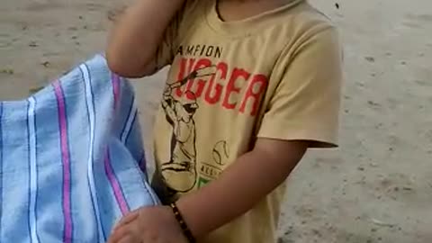Kabir talking to his father on the phone