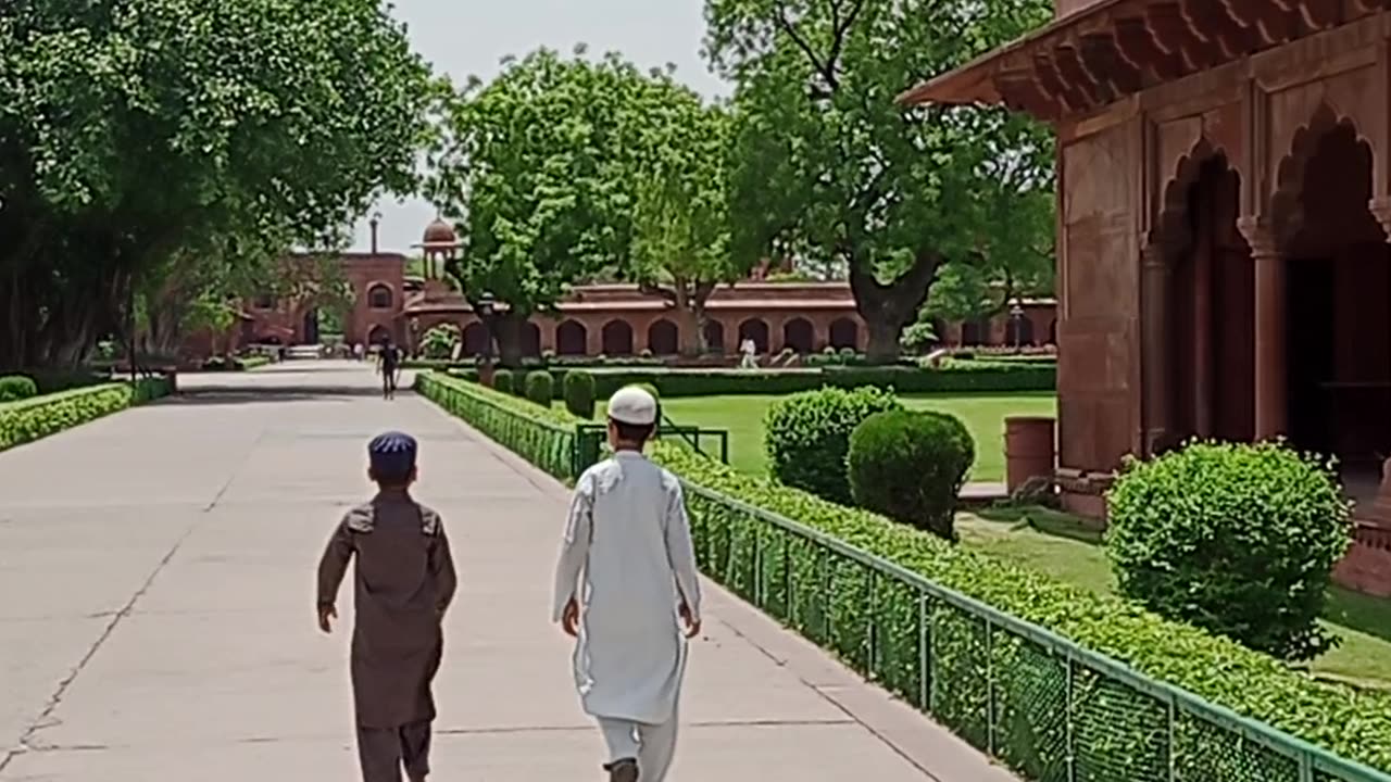 Kids going namaj in Taj Mahal