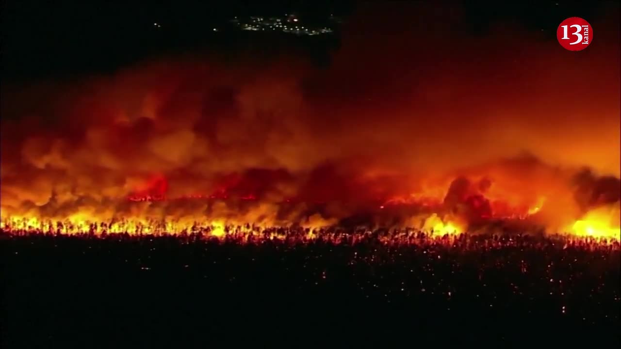 Aerial video shows massive forest fire burning at night in New Jersey