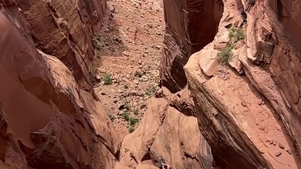 Swinging at the moab rope swing by Heavy