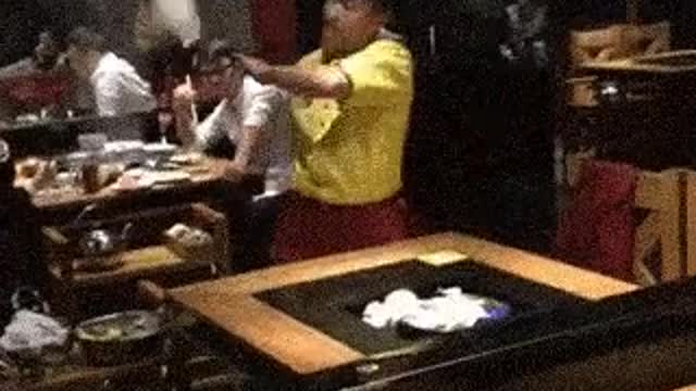 Waiter shows off cleaning skills