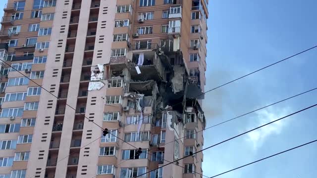 Moment rocket strikes Kyiv apartment block