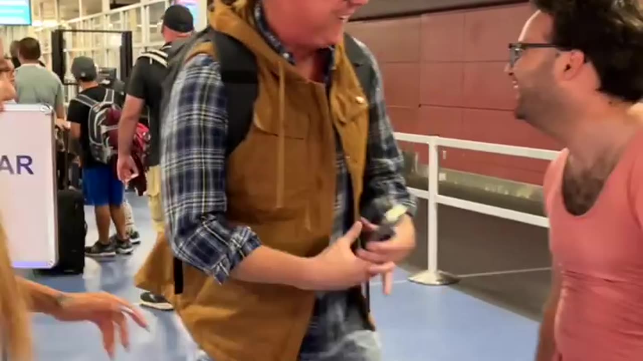 He put on a dress in the airport- most popular comedy