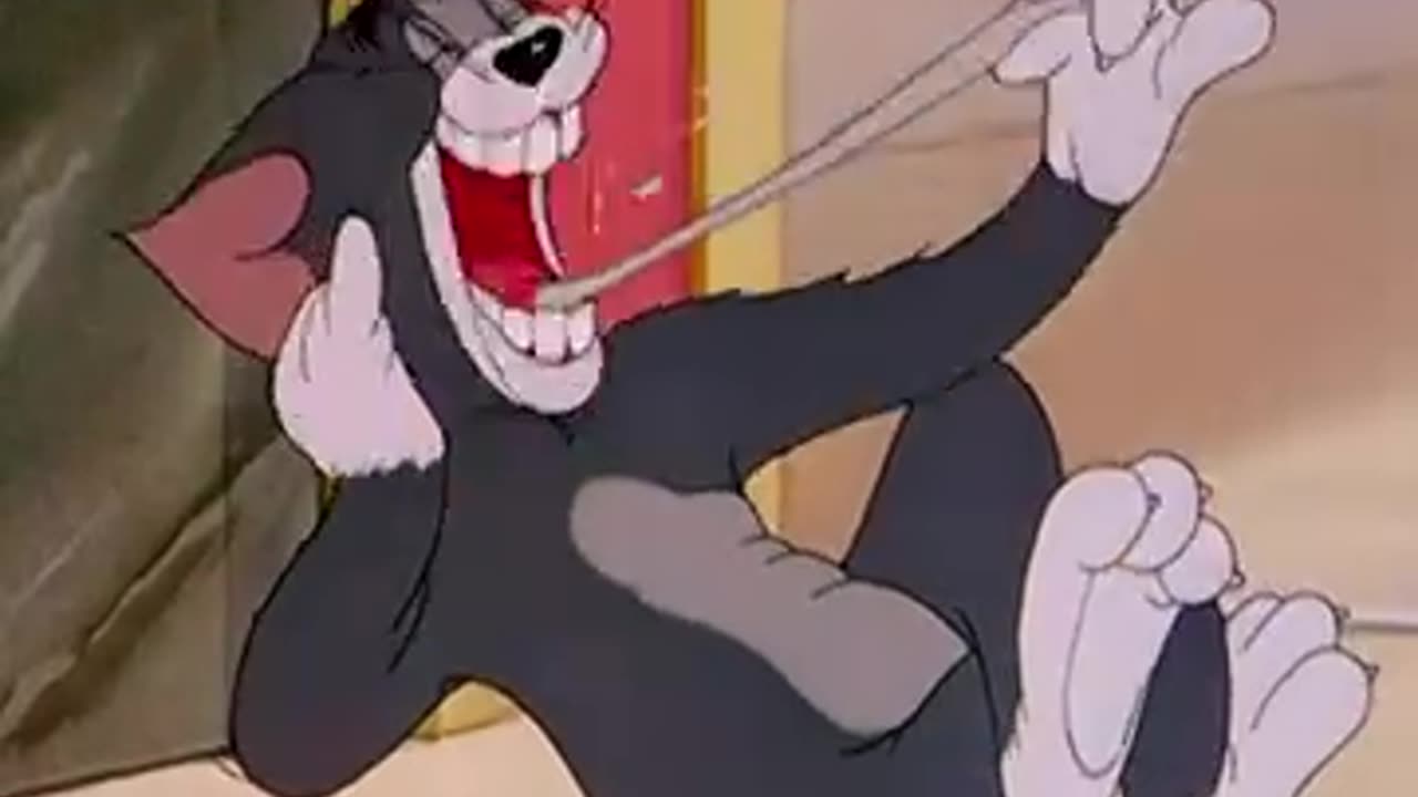 Certainly! How about the title "Epic Tom & Jerry Showdown" for video featuring Tom and Jerry
