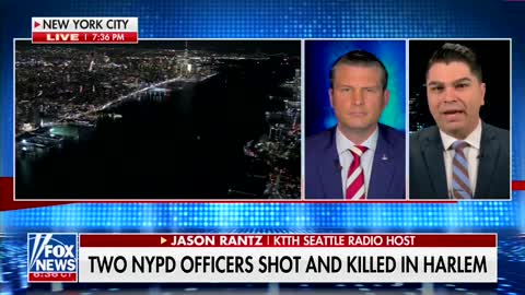 Two NYPD police officers shot and killed in Harlem.