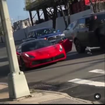Guy hops out Ferrari and hit Range Rover with bat