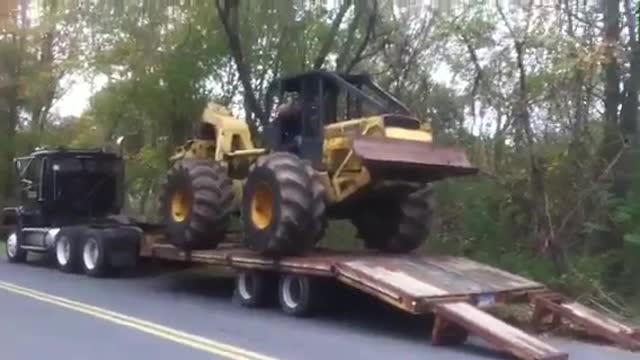 Loading 540b skidder onto 20ton trailer