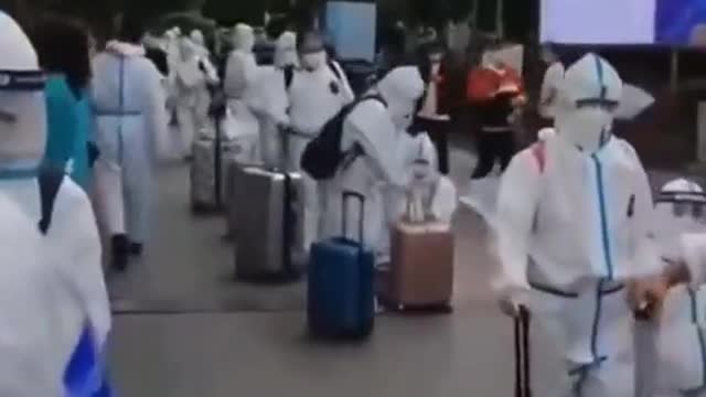 Chinese citizens heading off to the quarantine camps.