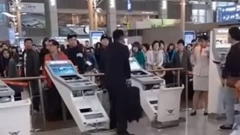 A drunk man passes electronic check-in for a flight