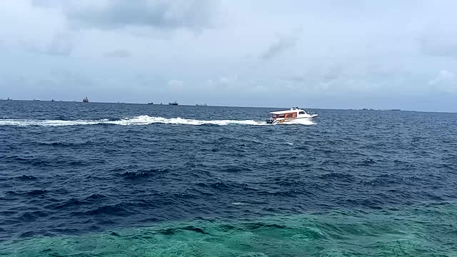 Male beach speed boat