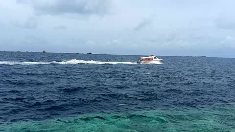 Male beach speed boat