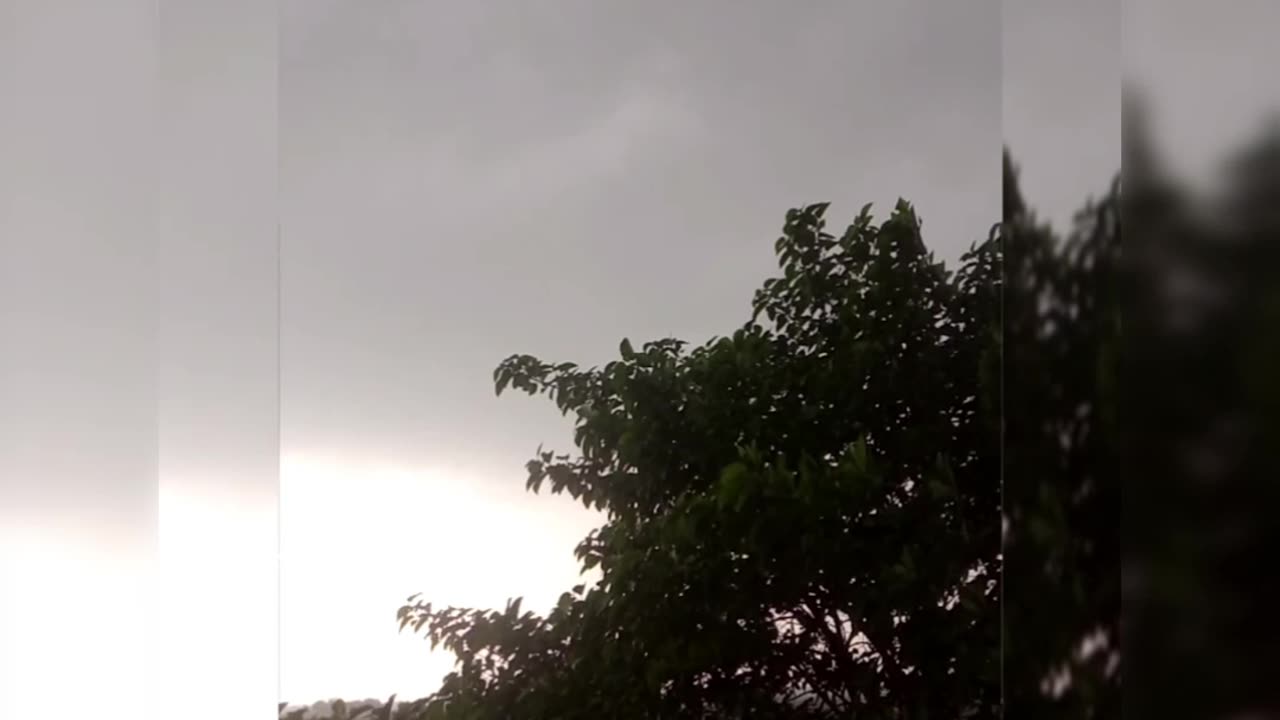 Storm Cloud and destructive wind in village