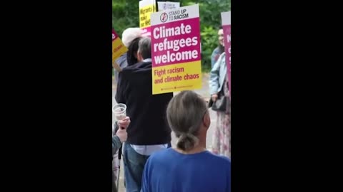 Farage surrounded by pro-refugee protestors upon Question Time arrival