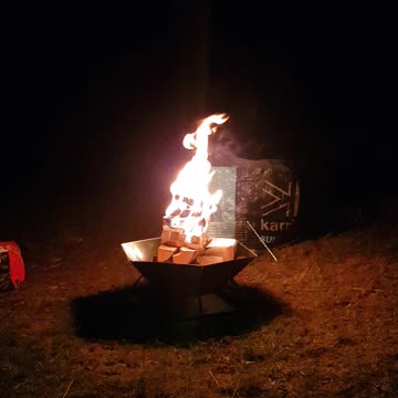 Campfire in a portable firepit..listen out for the owl