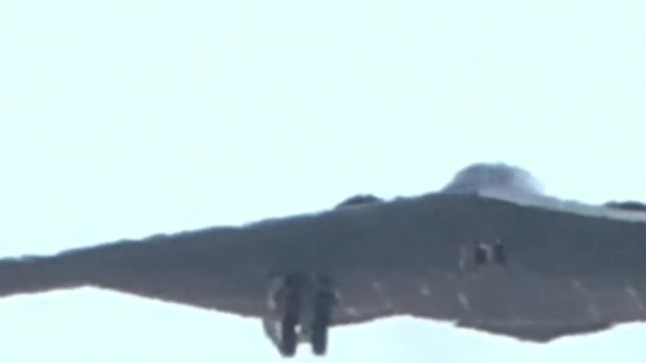 B-2 Spirit Stealth Bomber Soars in Clear Skies!