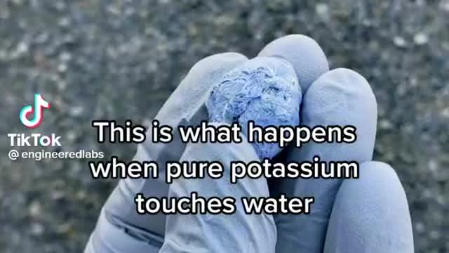 Potassium hits water big explosion
