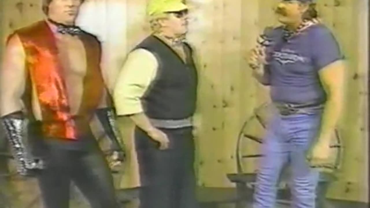 1984-mlw-Brutus beefcake looking shy bashful on blackjack mulligans barbeque