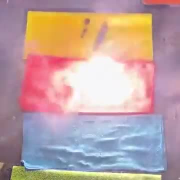 WATCH: Lasers bounce off the blue color spectrum.