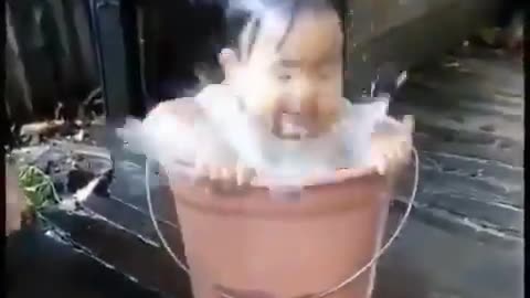 Baby in a bucket