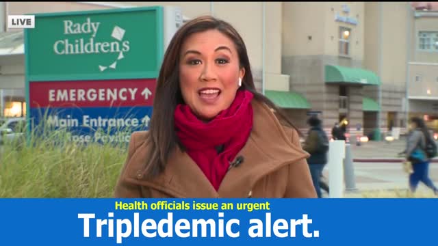 Health officials issue an urgent "Tripledemic" alert.