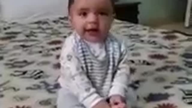 Baby is dancing with music