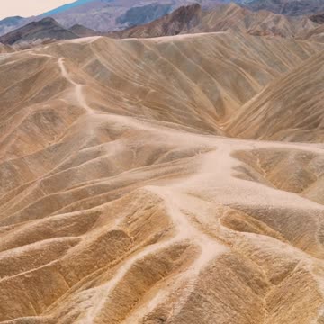 Between Dunes & Skies