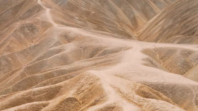 Between Dunes & Skies