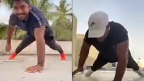 Man And Son Do One-Armed Pushups