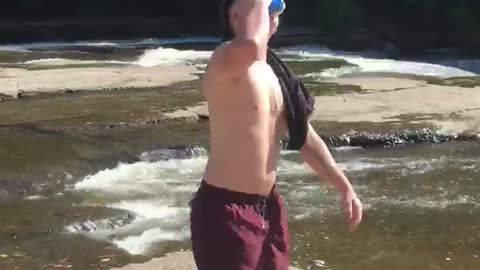 Music guy black shorts slamming beer to head