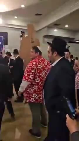 Jews dancing for their puppet Trump