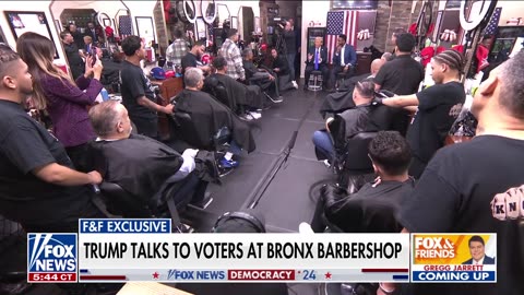 Trump talks to voters in surprise visit to Bronx barbershop