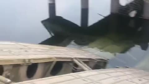 Russian Soldier Shows the Aftermath of a Ukrainian Airstrike on a Russian Pontoon Bridge