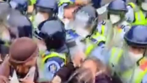 NZ police punching a women today!