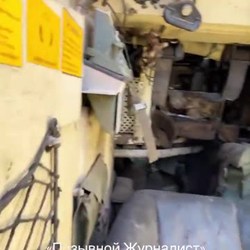 Russian soldiers showing a captured Swedish CV90 Infantry fighting vehicle of the Ukrainian army