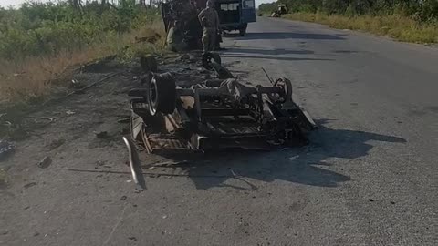 Russians Stuck On Side of the Road After Vehicle Blown in Half